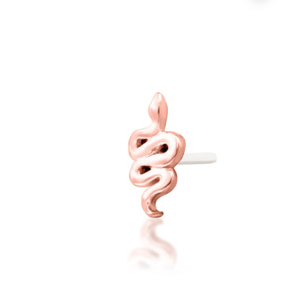 Coiled rose gold serpent stud positioned along a flat ear piercing for a bold polished detail.