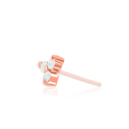 Rose gold opal cluster earring bringing soft colour to cartilage and flat piercings.