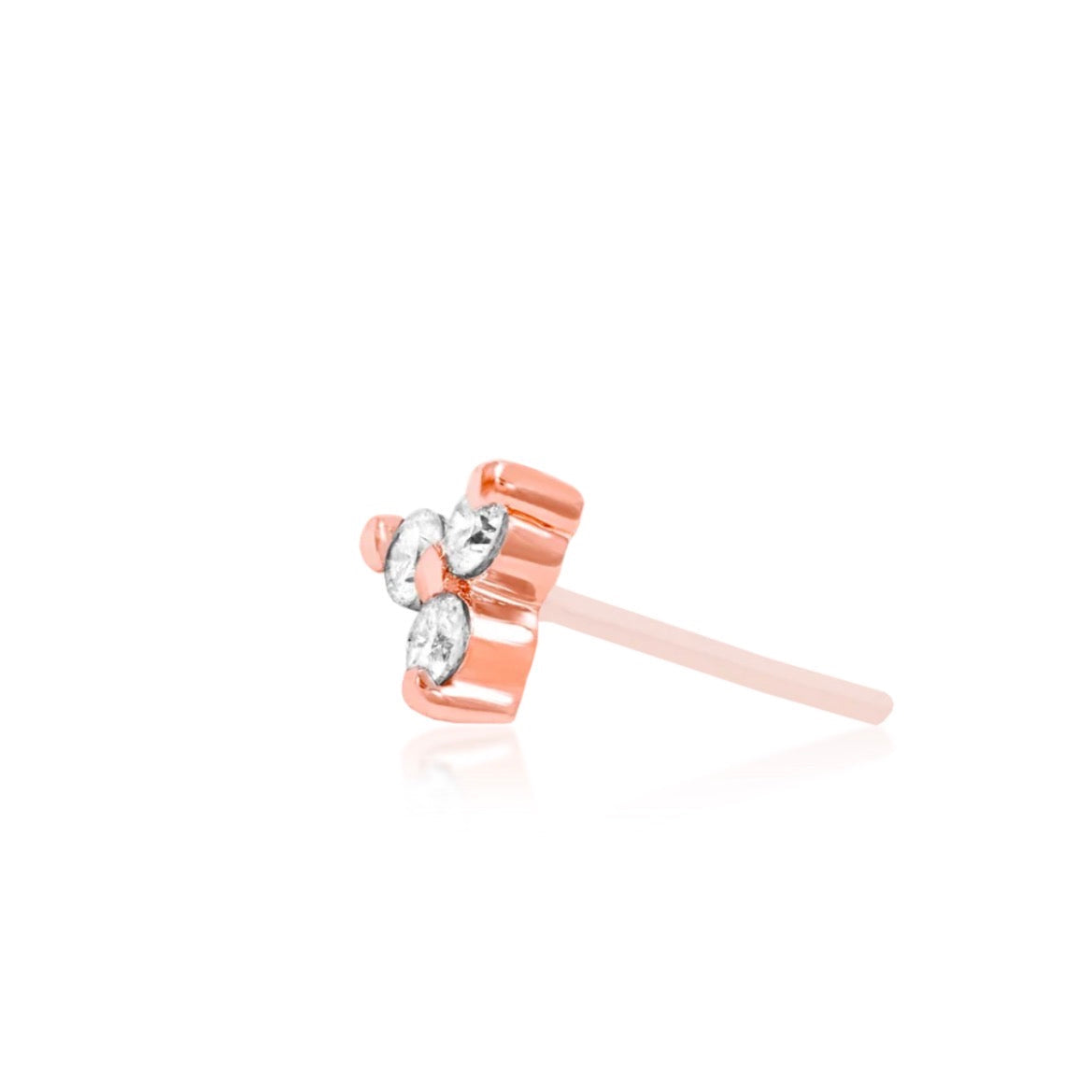 Rose gold cluster earring adding subtle sparkle to cartilage and flat piercings.