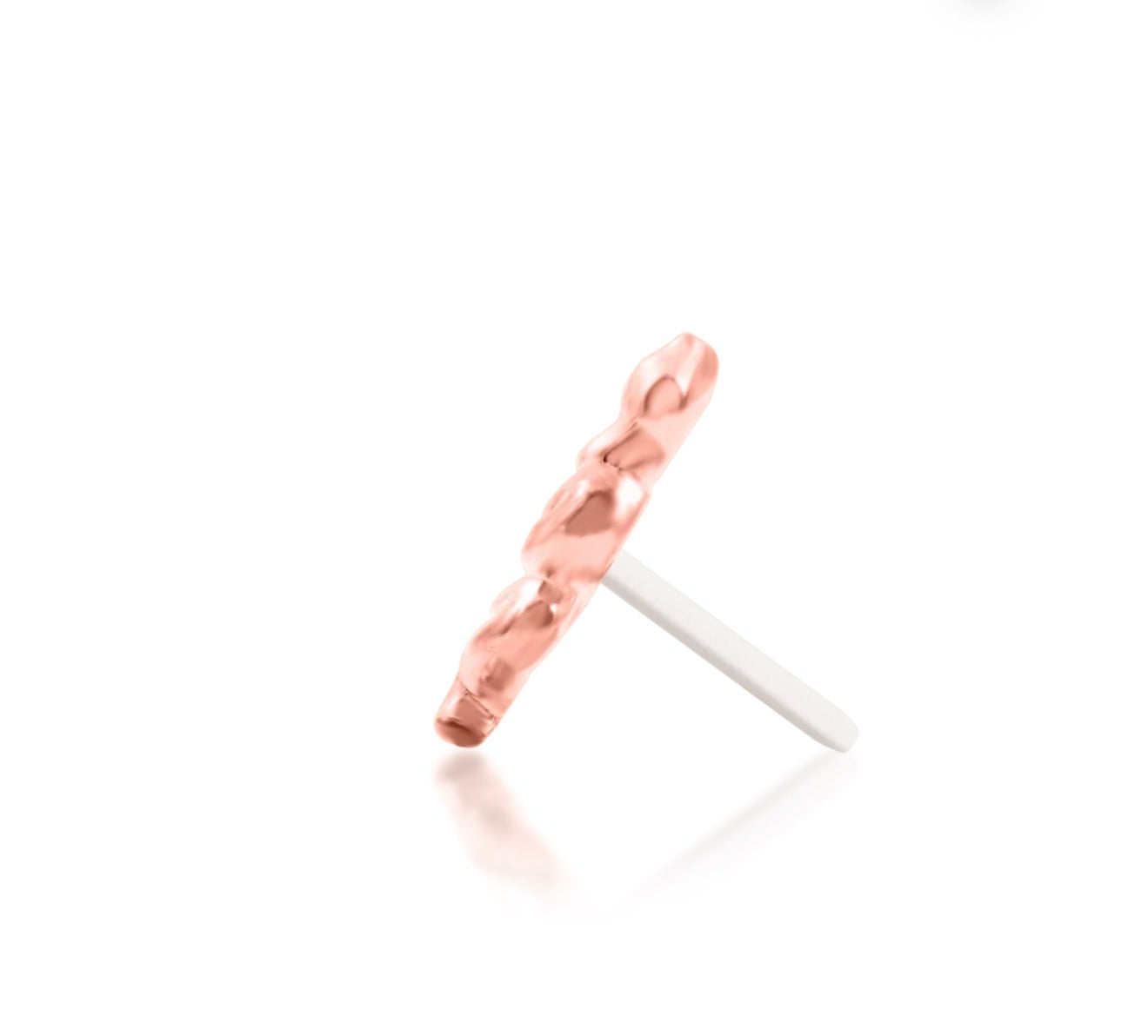 Smooth rose gold snake-shaped earring worn as a small statement in a lobe piercing.