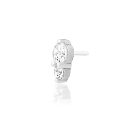 Minimal white gold ear stud with sparkling cubic zirconia for a curated ear stack.