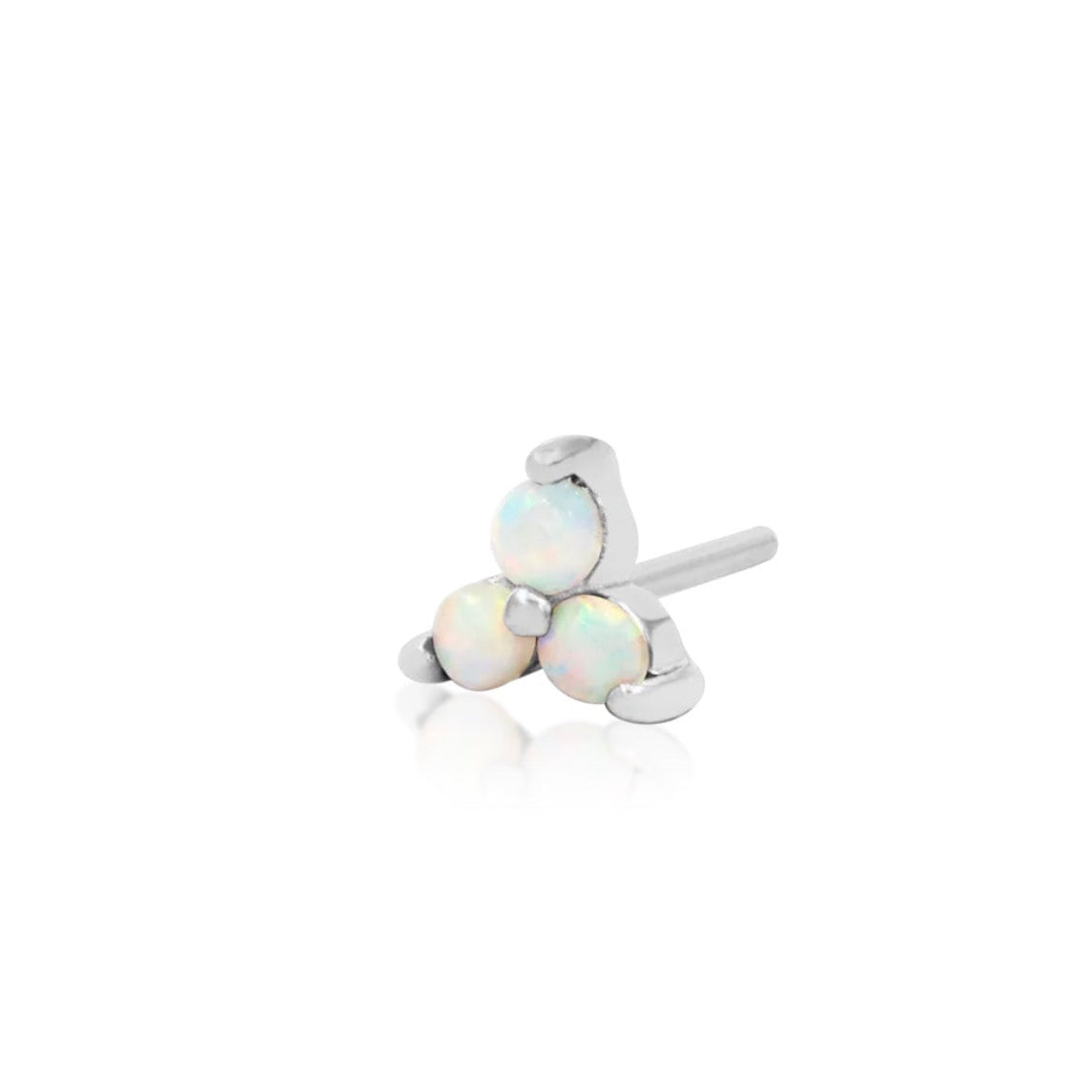 Three synthetic opals set in solid white gold creating a subtle focal point for a conch piercing.