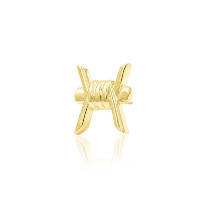     Alternative yellow gold conch earring featuring a sculpted barbed wire design