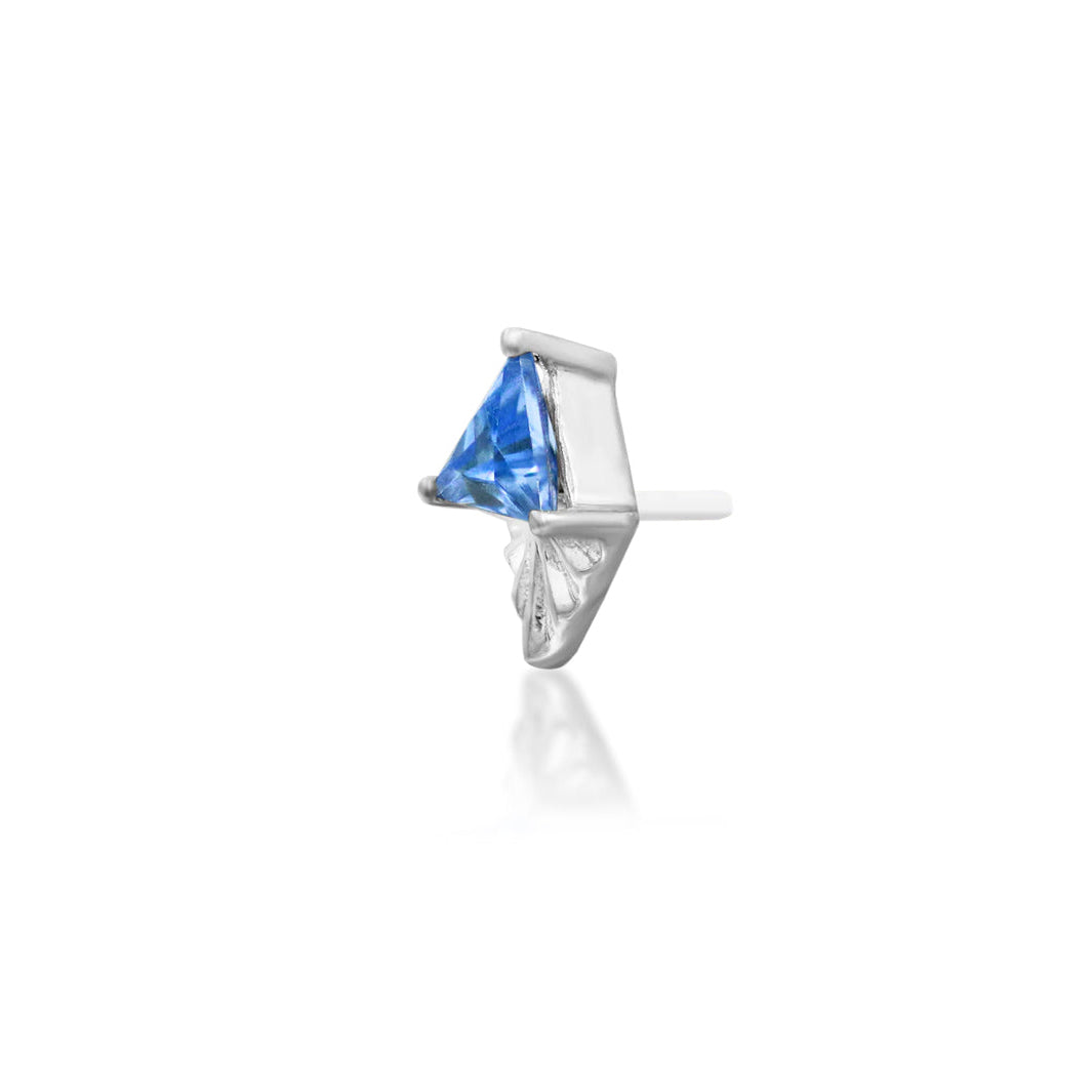 Architectural white gold conch jewellery with a cool lavender-blue cubic zirconia gemstone