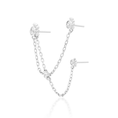 Architectural white gold ear chain designed to connect three existing piercings across the ear
