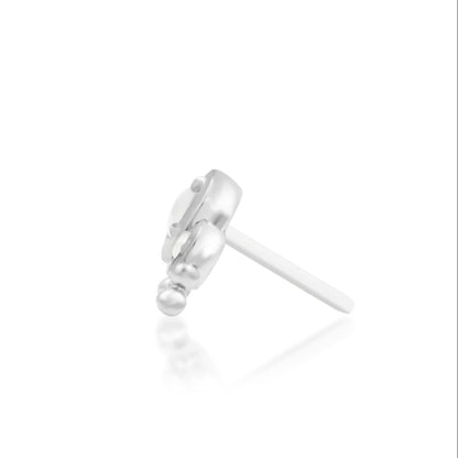 Beaded gemstone earring in white gold with luminous moonstones framed by polished gold texture.