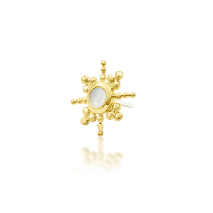 Angled yellow gold cartilage earring showing Ruth’s moonstone centre and radiating beaded design