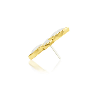 Side profile of Junipurr Betty showing its raised moonstone flower setting in yellow gold
