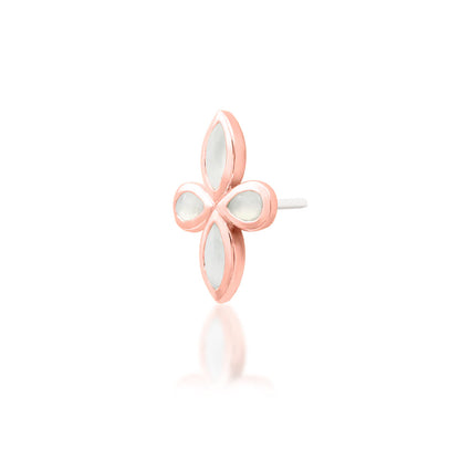 Side profile of Junipurr Betty showing the sculptural rose gold moonstone setting
