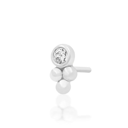 Bezel-set white CZ tragus earring crafted from solid 14k white gold