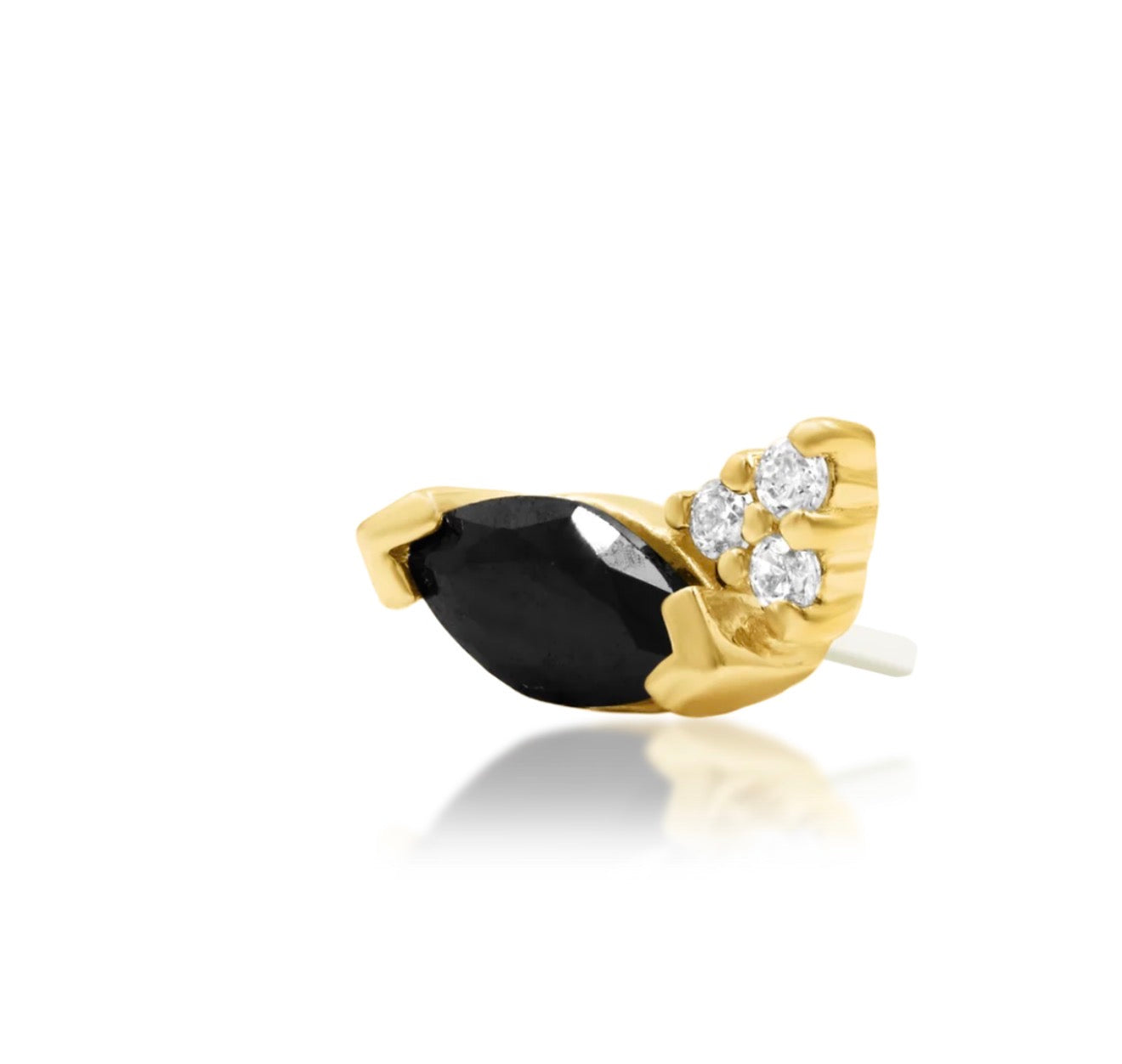     Vintage-inspired yellow gold conch earring featuring black and white cubic zirconia