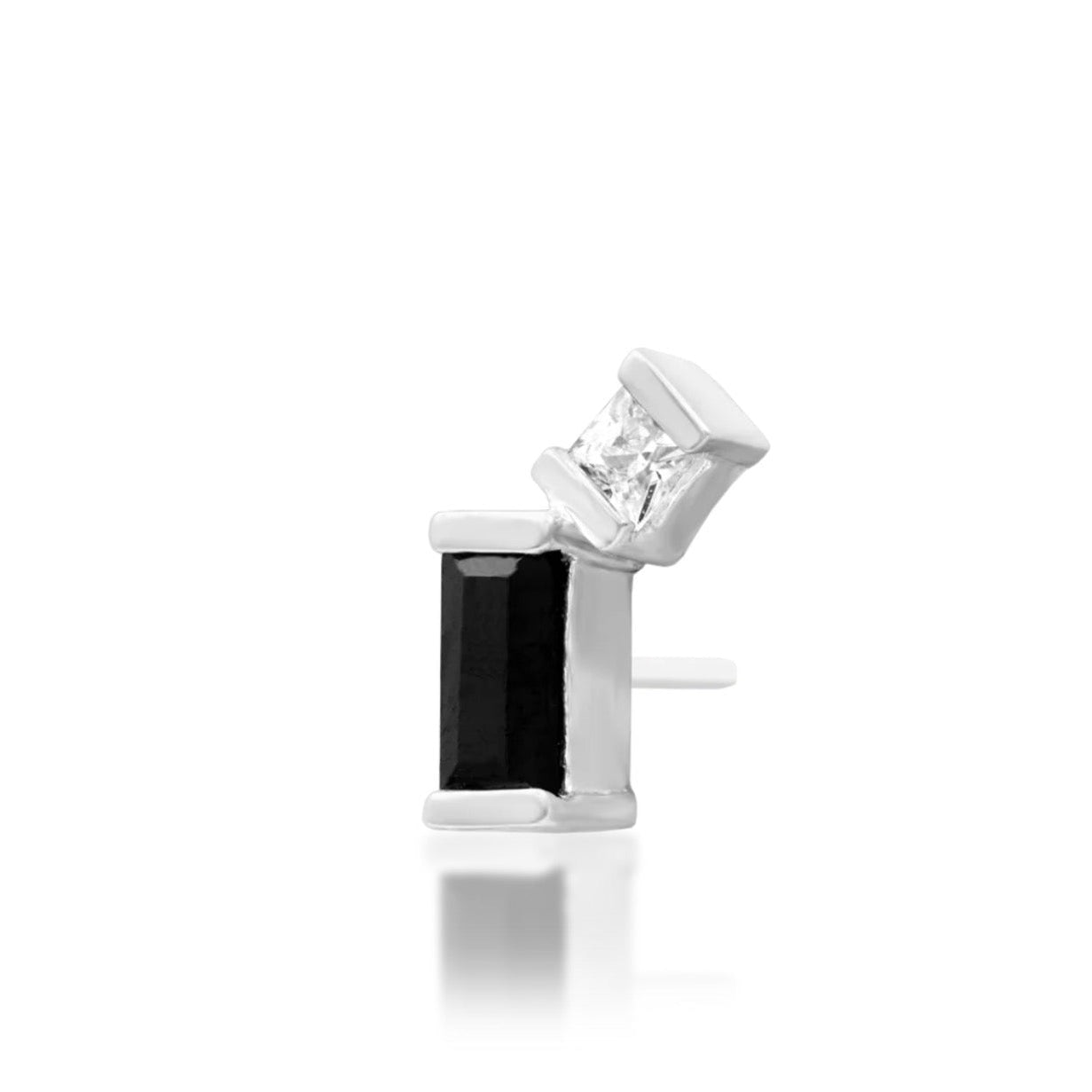 White gold conch earring featuring a bold geometric black and white cubic zirconia design