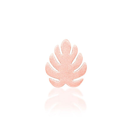 Botanical cartilage jewellery in white gold with a distinctive gemstone-free tropical leaf silhouette.
