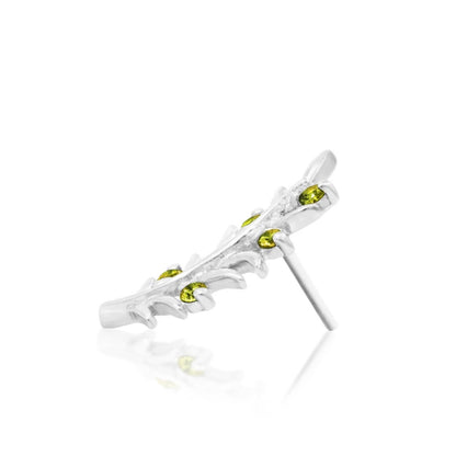Botanical conch jewellery in solid white gold with peridot-green CZ stones set through a graceful leaf design.