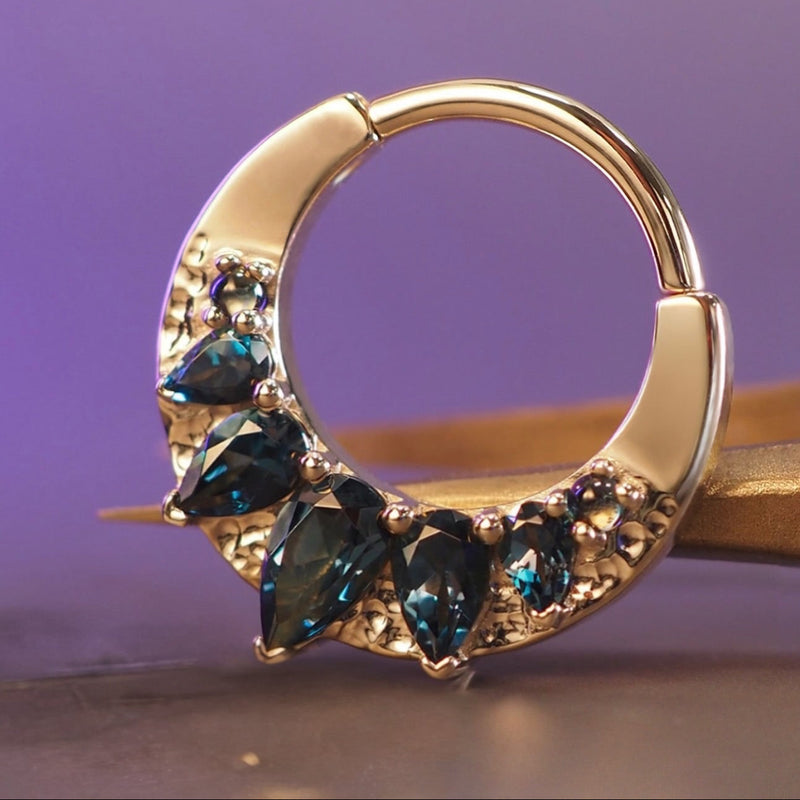 BVLA 14k gold clicker featuring London Blue Topaz gemstones, designed for septum, daith and cartilage piercings.