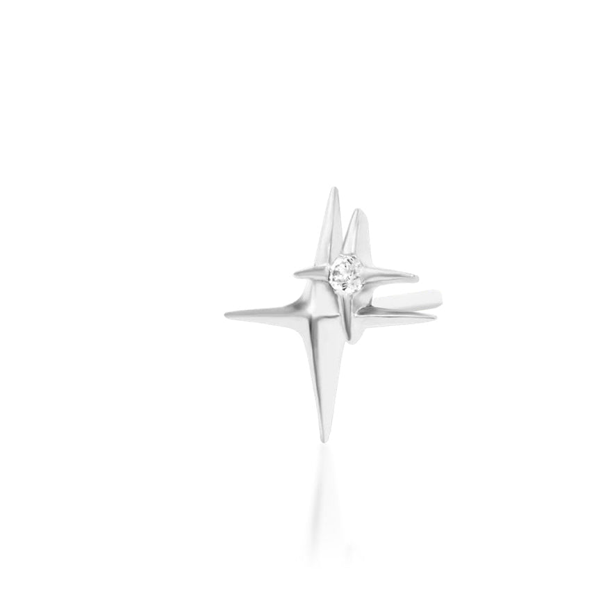 Celestial gold jewellery in white gold, shaped as two contrasting stars with a petite point of clear sparkle.

