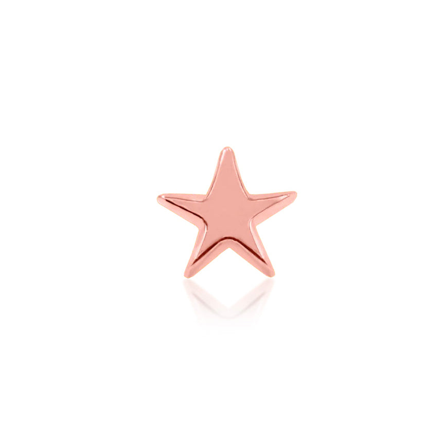 Celestial piercing jewellery in 14k rose gold featuring a polished star motif.