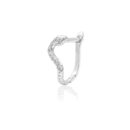 Celestial snake jewellery in white gold, featuring Junipurr Dusa’s sun, moon and star engravings.
