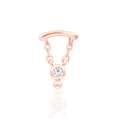 Conch dangle earring in solid 14k rose gold with an elegant articulated gemstone detail.