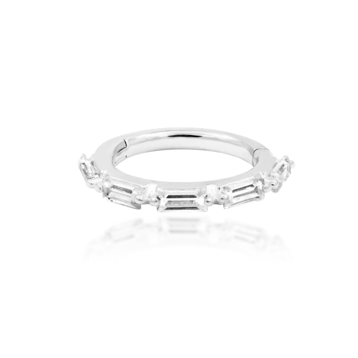 Cubic zirconia cartilage earring in 14k white gold, shown in Junipurr Annie’s five-stone baguette design.
