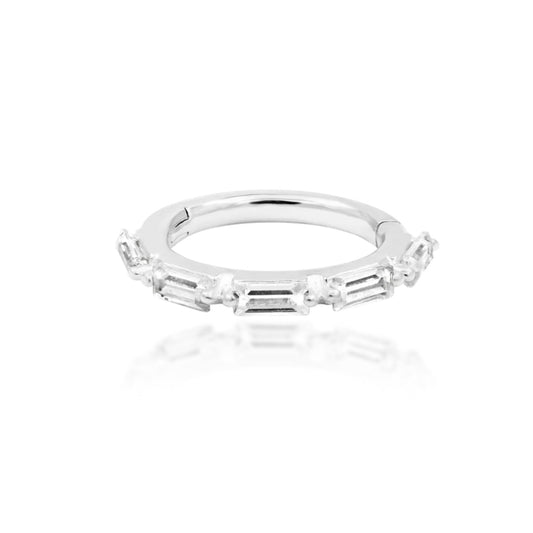 Cubic zirconia cartilage earring in 14k white gold, shown in Junipurr Annie’s five-stone baguette design.