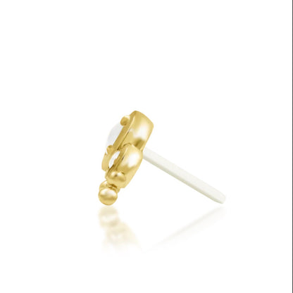 Curved ear climber in solid yellow gold, combining graduated moonstones with fine beaded detailing.
