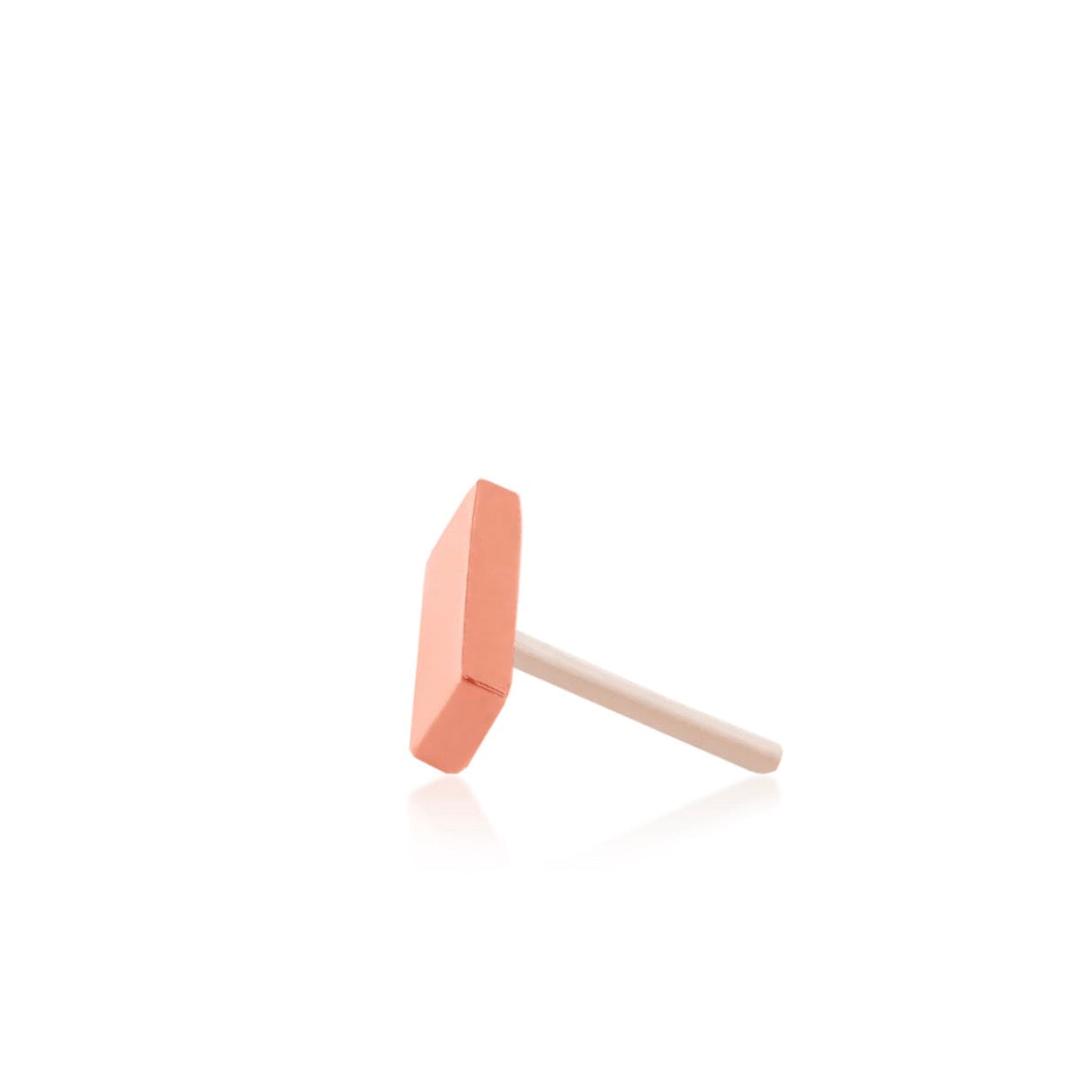 Rose gold cartilage stud with a narrow bar shape positioned on a diagonal