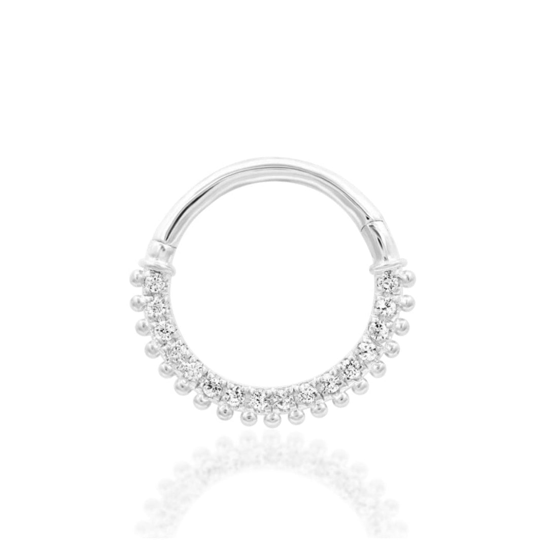 Diamond-look gold piercing ring in 14k yellow gold, set with highly reflective white cubic zirconia.