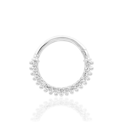 Diamond-look gold piercing ring in 14k yellow gold, set with highly reflective white cubic zirconia.