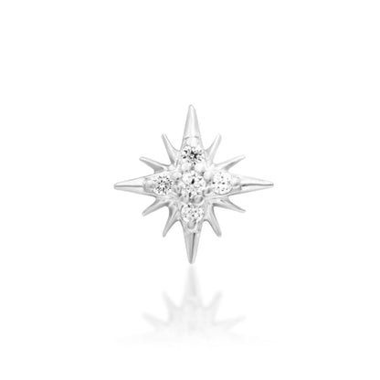 Flat piercing earring in 14k white gold with a symmetrical starburst and clear CZ centre.
