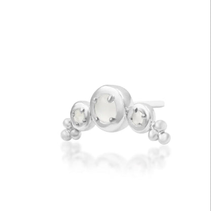 Flat piercing jewellery in solid white gold, featuring Envee’s elongated 9.2mm moonstone arc.
