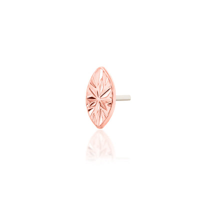 Gemstone-free gold jewellery in rose gold, using laser engraving to create reflective marquise detail.