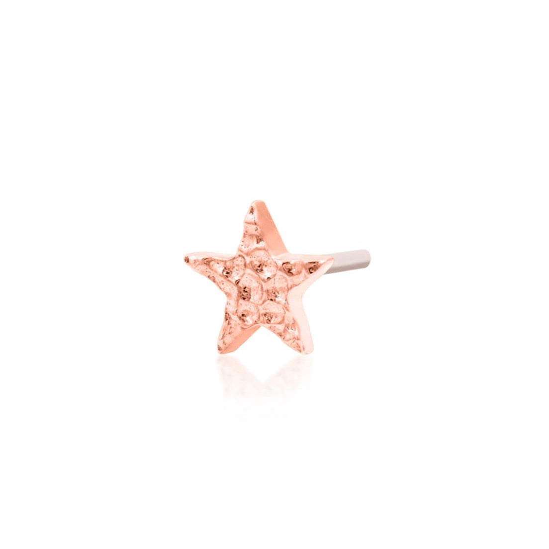 Gemstone-free gold jewellery in rose gold, using hammered texture to give the small star a subtle glow.