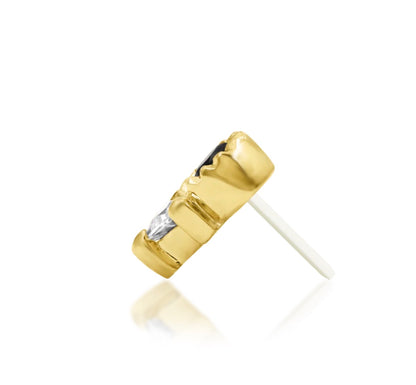 Geometric yellow gold cartilage stud featuring contrasting black and white cubic zirconia