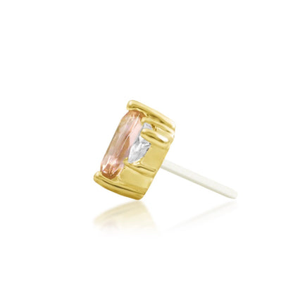 Geometric conch earring featuring warm Pink Champagne cubic zirconia set in polished yellow gold.