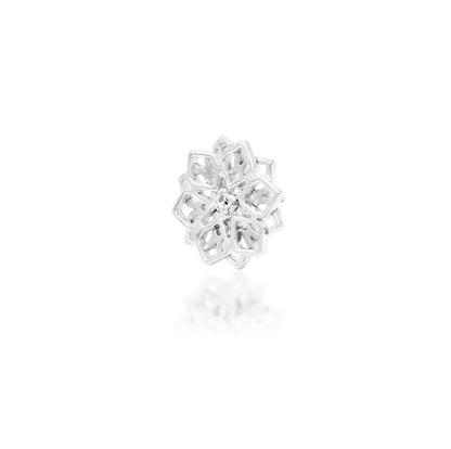 Geometric gold earring in white gold, combining pointed symmetry with a petite cubic zirconia accent.