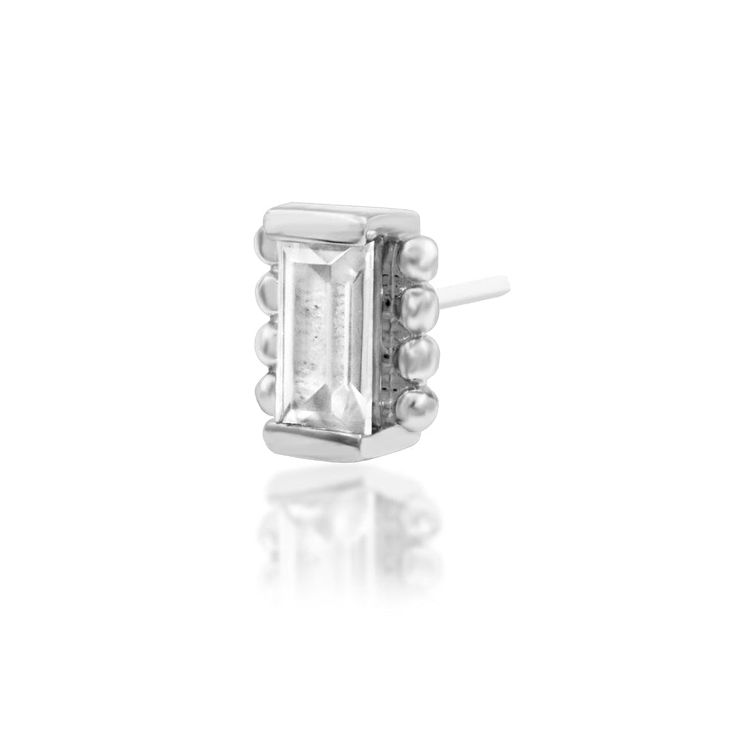     Geometric solid gold helix jewellery with an elongated rectangular gemstone