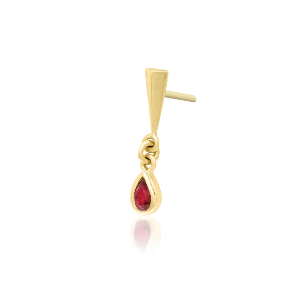 Yellow gold cartilage jewellery with a miniature stake and dark red Garnet cubic zirconia drop