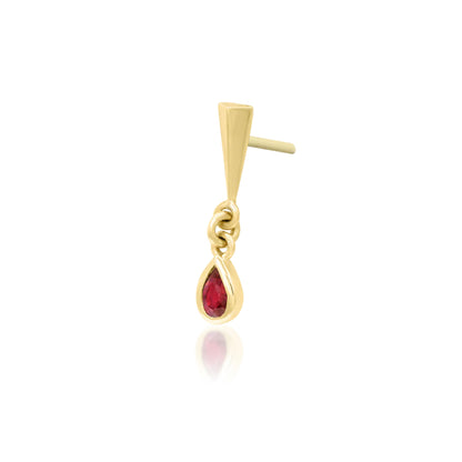 Yellow gold cartilage jewellery with a miniature stake and dark red Garnet cubic zirconia drop