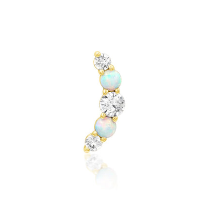 Junipurr Dani gold conch earring in solid 14k yellow gold with white opals and cubic zirconia