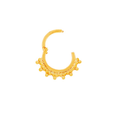 Gold daith ring in 14k yellow gold featuring the decorative beaded edge of Junipurr Halo.

