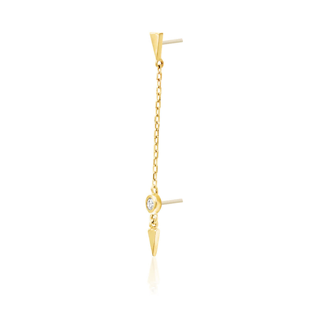 Yellow gold ear chain with two arrowhead ends and a bezel-set cubic zirconia
