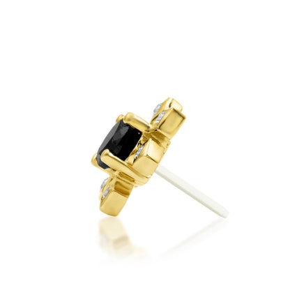     Solid gold flat earring featuring six geometric petals around a black cubic zirconia