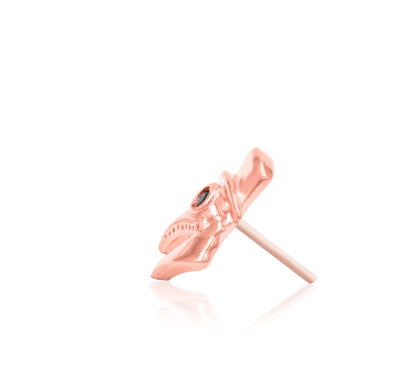 Solid 14k rose gold piercing stud shaped like a plague doctor mask with black gemstone detail