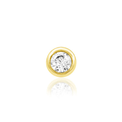 Junipurr gold tragus earring with a bezel-set white CZ in solid 14k yellow gold