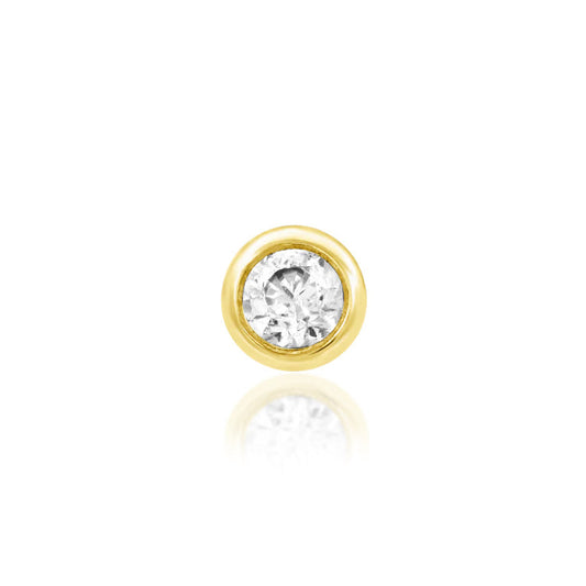 Junipurr gold tragus earring with a bezel-set white CZ in solid 14k yellow gold