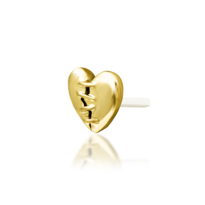 Heart cartilage earring in solid 14k yellow gold with a modern sculpted silhouette. alternate view