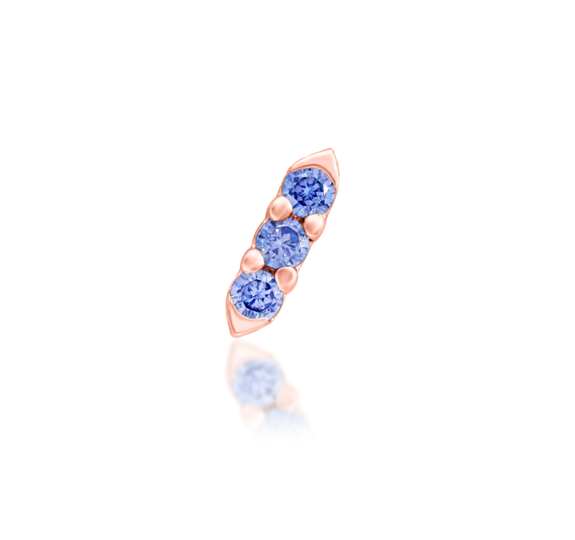 Junipurr Adea solid 14k rose gold Light Tanzanite CZ threadless end, angled view.