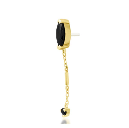 Angled view of Junipurr Akasha black CZ chain threadless end in 14k yellow gold.