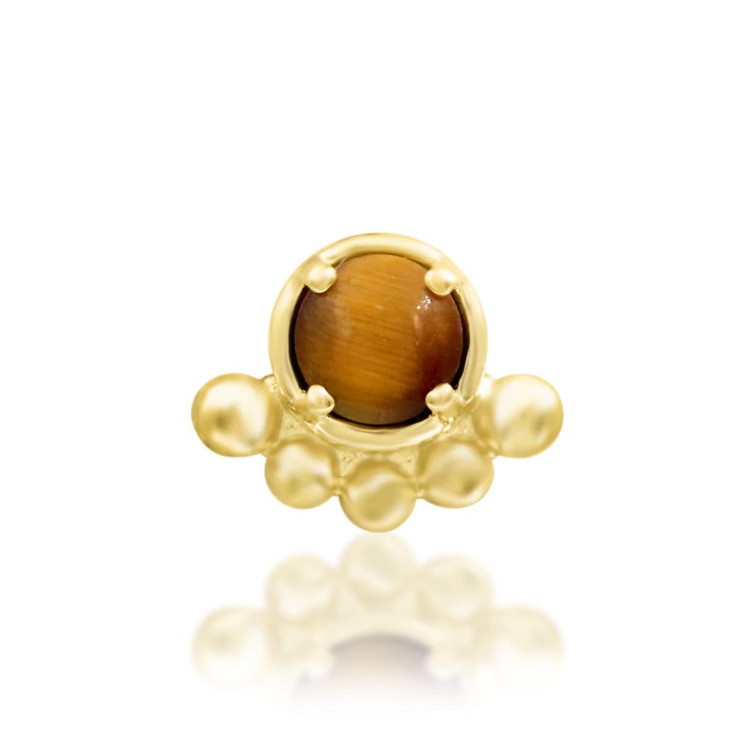 Junipurr Anele yellow gold jewellery with a round tiger eye and polished bead accents.